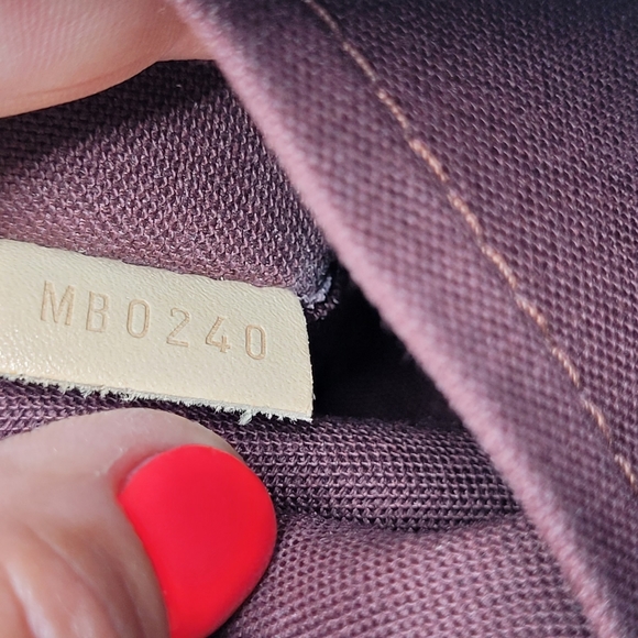 LOUIS VUITTON RIVOLI PM - Picture 14 of 15